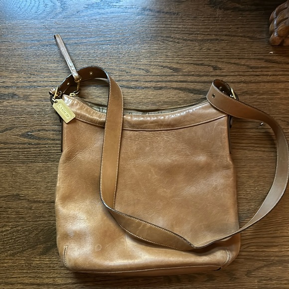 Coach Handbags - Camel colored leather Coach bag. Can be worn as crossbody or shoulder bag.